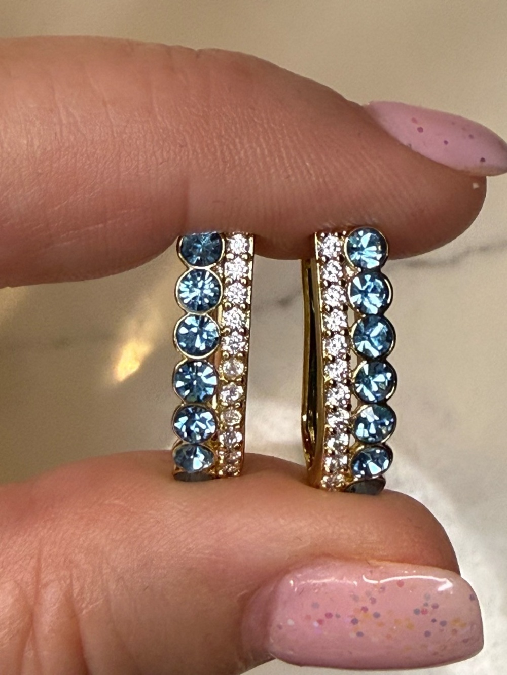 Blue topaz huggie earrings with CZ stones